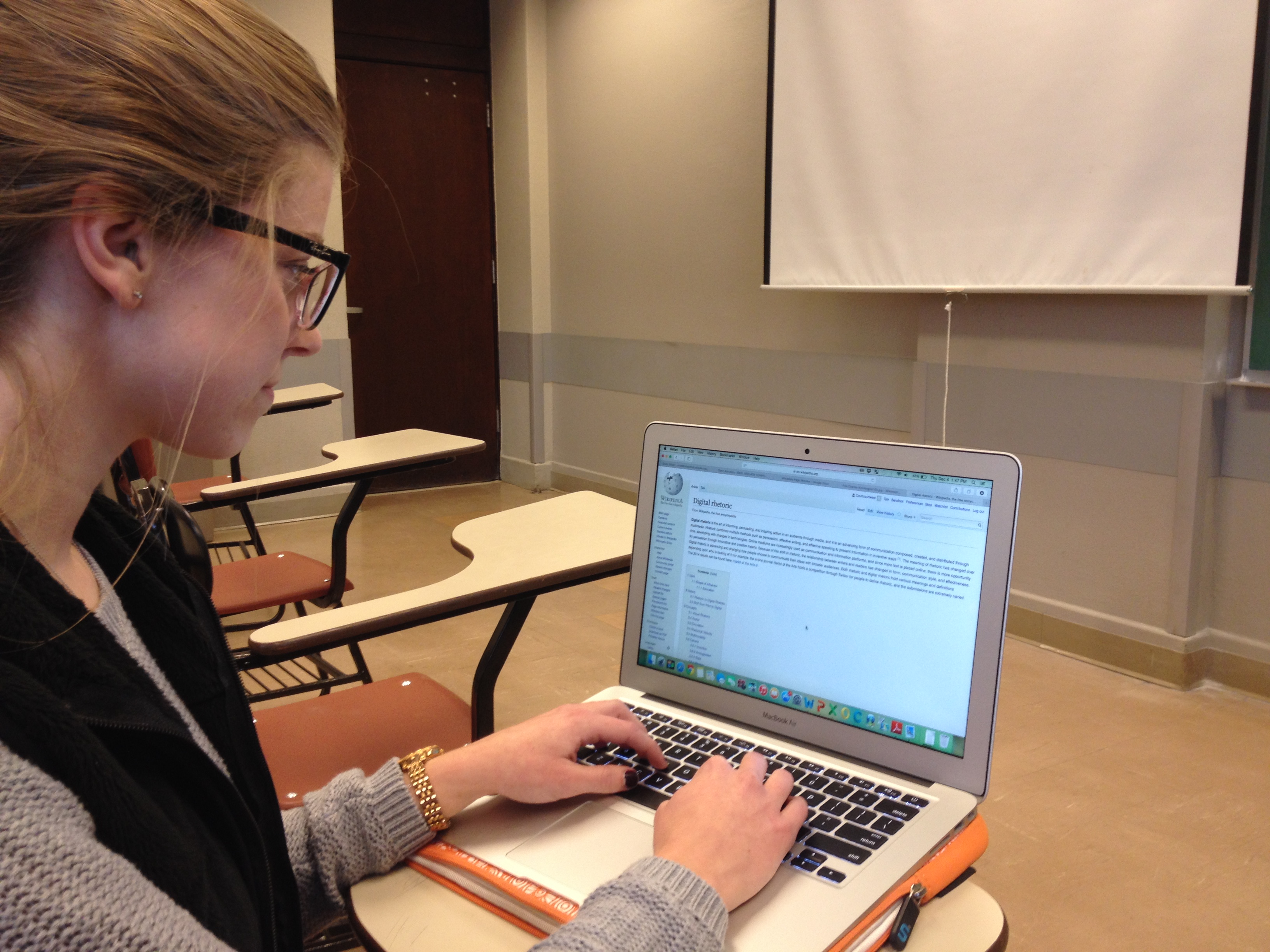 Students practicing code during a programming class